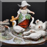 P12. Porcelain figurine of girl with geese. 